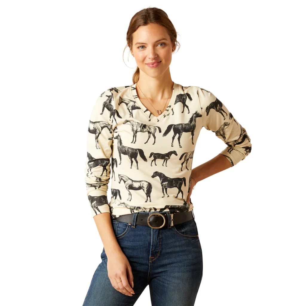 woman wearing sepia long sleeve t-shirt with black horses