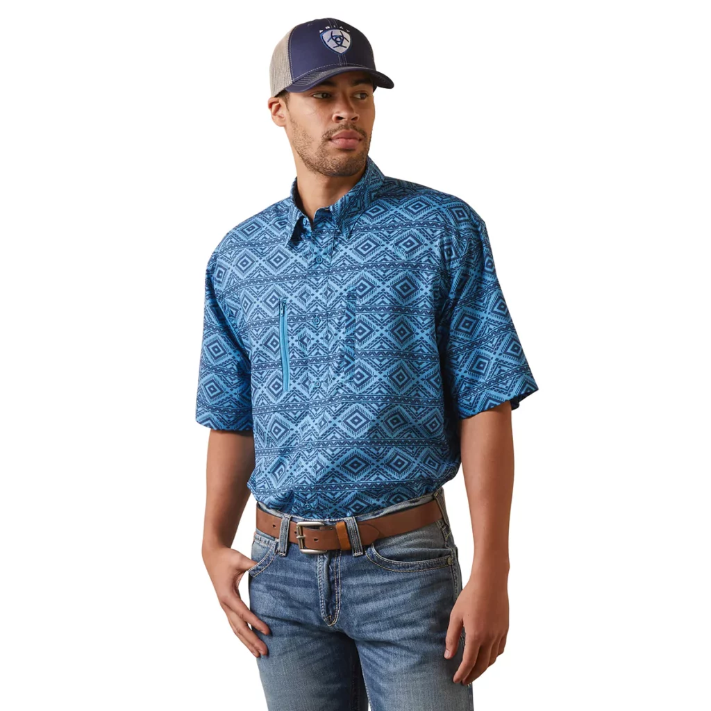 Man wearing Ariat diamond patterned short sleeve shirt in blue 