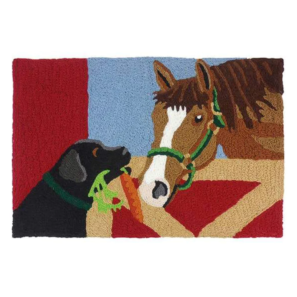 rug with a black dog feeding brown horse a carrot