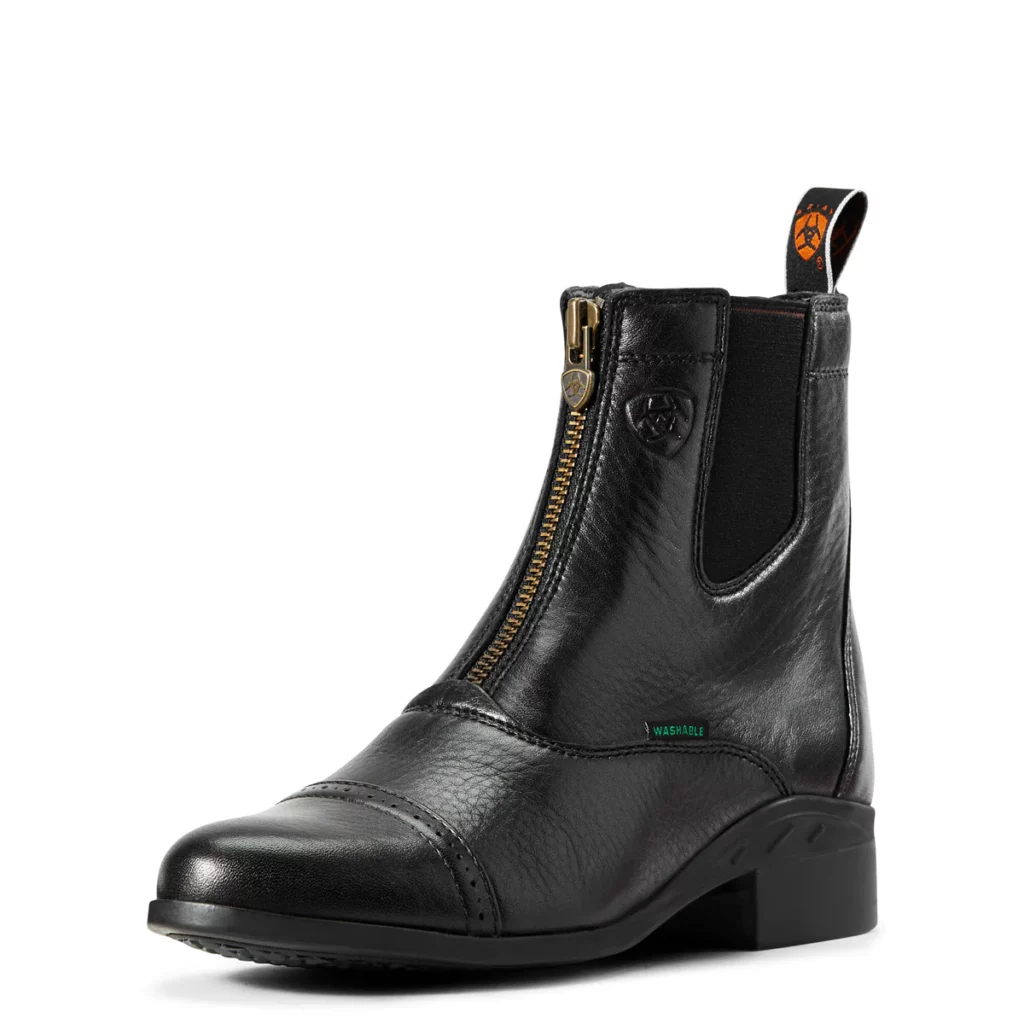Black Ariat paddock boots with gold front zipper