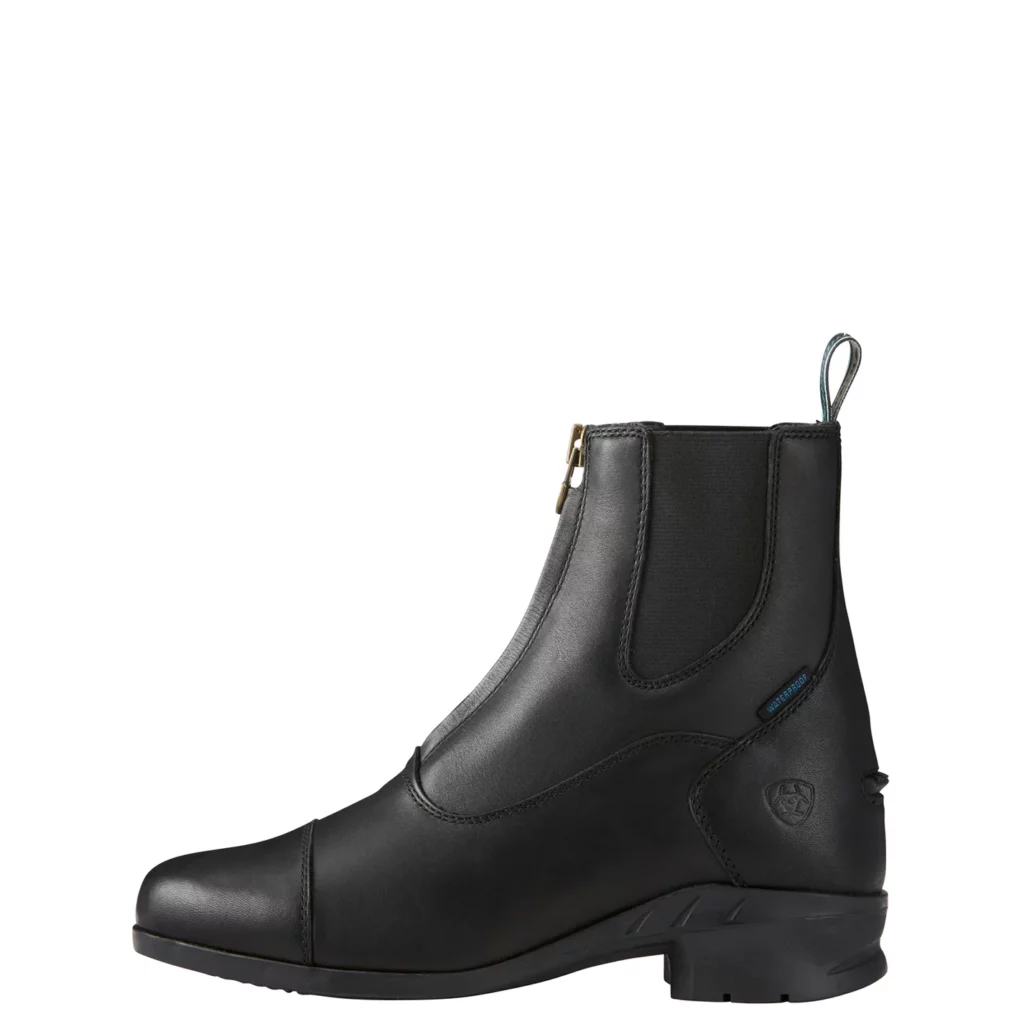 Black Ariat paddock boots with bronze front zipper