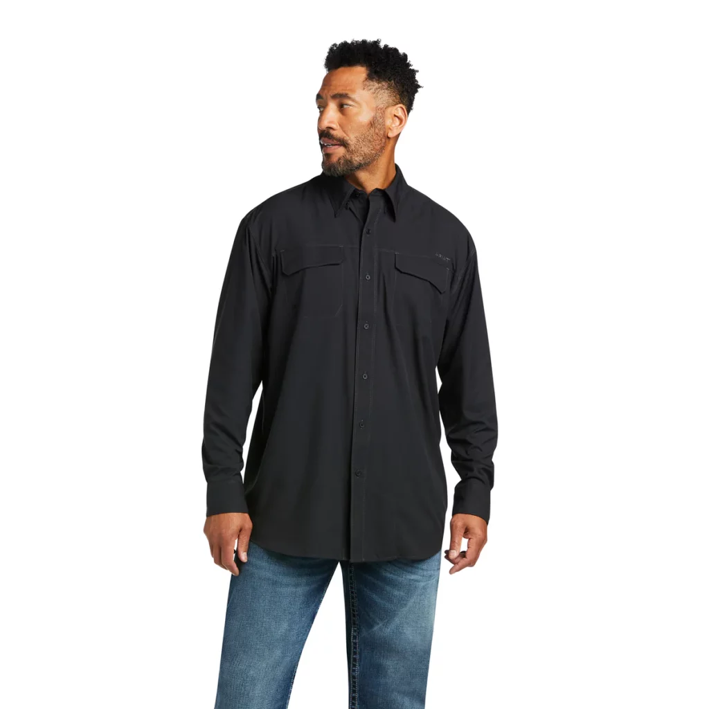 Man wearing black long sleeve button down shirt